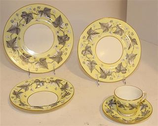 A Partial Set of Wedgwood Dinnerware Diameter of dinner plate 7 5/8 inches.