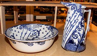 * A Royal Doulton Pottery Pitcher and Basin. Height of pitcher 14 1/2 inches.
