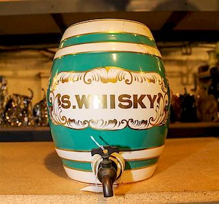 * A Ceramic Whiskey Dispenser Height 11 inches.