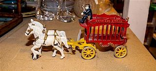 A Cast Iron Toy Wagon, Overland Circus Length overall 13 inches.