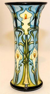 A Moorcroft Pottery Vase. Height 10 inches.