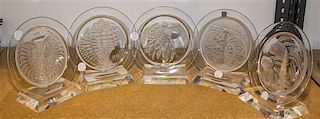 Five Lalique Molded Glass Annual Plates Diameter 8 5/8 inches.