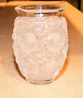 * A Lalique Molded and Frosted Glass Vase. Height 6 5/8 inches.