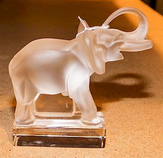 * A Lalique Molded Glass Figure of an Elephant. Height 6 1/8 inches.