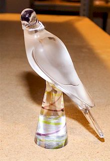 * A Lalique Molded and Frosted Glass Bird Figure Height 8 1/4 inches.