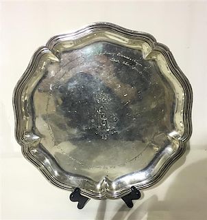A German Silver Presentation Tray, Bruckmann & Sohne, Heilbronn, of shaped circular form with reeded edges, engraved with an 
