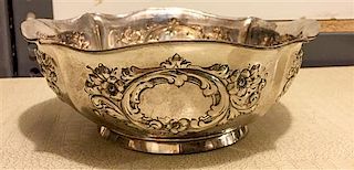 An American Silver Center Bowl, International Silver Co., Meriden, CT, of quatrefoil form, the body worked with foliate volut
