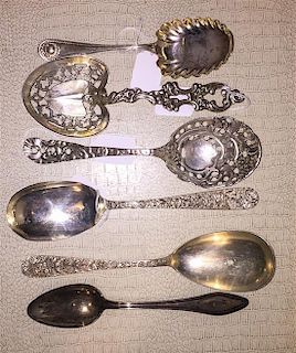 A Group of American Silver Serving Articles, various makers, comprising pierced serving spoons, berry spoons, a ladle and oth