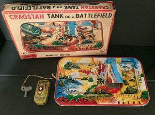 Cragstan Tin wind-up toy with vehicle