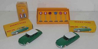 Lot of Dinky vehicles and signs with orig box