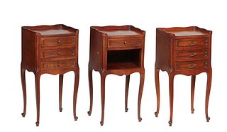 Group of Three Louis XV Style Carved Cherry Nightstands, 20th c., with three-quarter galleried tops, two with a bank of three drawers, one with a frie