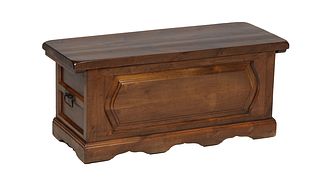 French Provincial Carved Beech Bedding Box, 20th c., the rounded corner lid over a front with an applied panel, on a plinth base, H.- 17 in., W.- 39 1