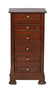 French Louis Philippe Carved Walnut Nightstand, late 19th c., the canted corner top over a frieze drawer and faux five drawer cupboard door, on a plin