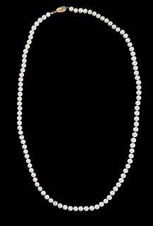 Strand of 6.5mm Cultured Pearls, with a 14K yellow gold clasp, L.- 28 in.