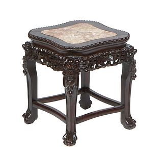 Chinese Carved Hardwood Marble Top Taboret, 20th c., the shaped figured brown marble inset beaded rim top over a pierced skirt, on floral carved legs 