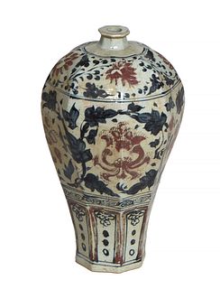 Chinese Octagonal Baluster Earthenware Vase, 20th c., of tapered form with leaf and floral decoration in iron red and dark blue, H.- 14 in., Dia.- 7 1
