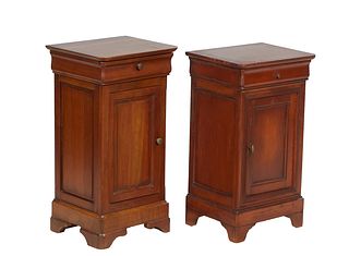 Near Pair of French Louis Philippe Style Carved Walnut Nightstands, late 19th c., the rounded corner top over a cavetto frieze drawer and a lower cupb