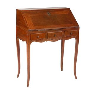 French Louis XV Style Carved Walnut Slant Front Secretary, 20th c., the rectangular top over a slant lid fitted with a gilt tooled green leather writi