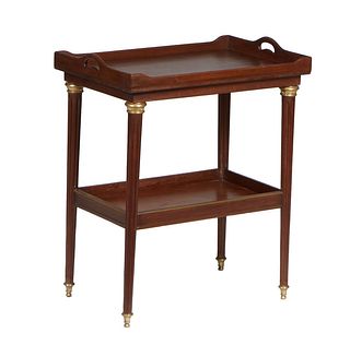 French Louis XVI Style Ormolu Mounted Walnut Dresser Table, the galleried top with two side hand holes on turned tapered reeded legs joined by an ormo