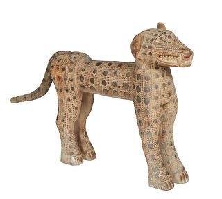 Large African Carved and Polychromed Wood Leopard, 20th c., with an articulated tail, H.- 29 in., W.- 9 in., D.- 46 in.