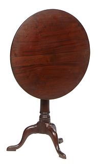 English Carved Mahogany Tilt Top Table, 19th c., the circular top over a bird cage support to a turned tapered column, on tripodal cabriole legs with 