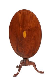 English Inlaid Mahogany Tilt Top Side Table, 19th c., the oval top on a turned support to tripodal pointed pad feet, Closed H.- 42 1/2 in., Open H.- 2