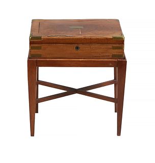 English Brass Inlaid and Mounted Mahogany Campaign Style Lap Desk, 19th c., on a later stand with tapered square legs, joined by an X-form stretcher, 