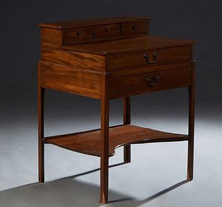 English Carved Oak Writing Table, early 20th c., the rectangular superstructure with three small frieze drawers, on a base with a bank of two drawers,