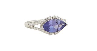 Lady's 18K White Gold Dinner Ring, with a horizontal 2.15 ct. marquise tanzanite, centering diamond mounted split sides and shoulders of the band, tot