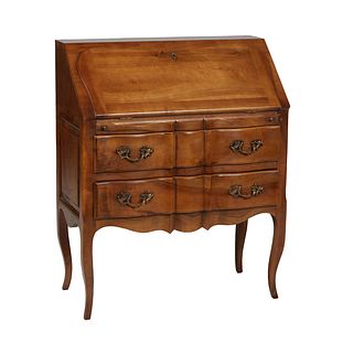 French Louis XV Style Carved Walnut Slant Front Desk Secretary, early 20th c., with an inset gilt tooled leather writing surface in front of an interi