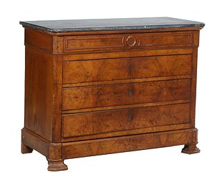 French Louis Philippe Carved Walnut Marble Top Commode, 19th c., the rounded corner and edge figured gray marble over a frieze drawer above three deep