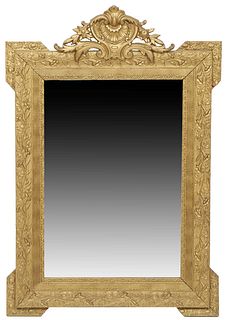 French Louis XV Style Gilt and Gesso Overmantel Mirror, late 19th c., with a pierced relief shell, floral and leaf crest over a wide frame with relief