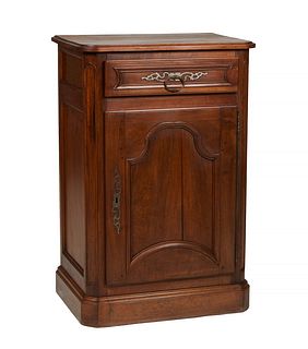 French Louis XV Style Carved Walnut Confiturier, late 19th c., the ogee edge stepped rounded corner top over a frieze drawer with an iron escutcheon, 