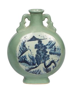 Chinese Celadon Moon Vase, 20th c., with serpentine handles over a landscape reserve on each side, on an oval stepped base, H.- 12 1/2 in., W.- 10 in.