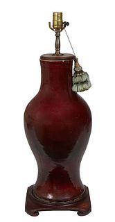 Large Oriental Oxblood Baluster Vase, 19th c., now with a wooden cap and square scrolled base and wired as a lamp, H.- 20 in., Dia.- 10 in. Provenance