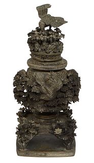 Large Bronze Asian Censer, 19th c., with an eagle mounted floral relief lid over baluster sides with high relief leaf and floral decoration, on a squa