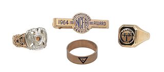 Group of Four Items, two 10K yellow gold and enamel rings, Size 9, one with Masonic decoration, size 10, one 14K with a white gold eagle, size 9; and 