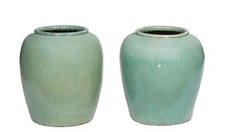 Pair of Large Glazed Terracotta Baluster Oil Jars, 20th c., in green glaze, H.- 28 in., Dia.- 25 1/2 in.
