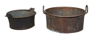 Two Large Iron Pots, 19th c., one with ring handles, one with a folding iron handle, Largest- H.- 17 1/2 in., W.- 33 1/2 in., D.- 31 in.