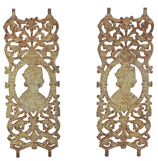 Pair of Wrought Iron Railing Supports, 19th c., with an oval medallion of a queen in profile, with scrolled sides, top and bottom, H.- 31 1/2 in., W.-