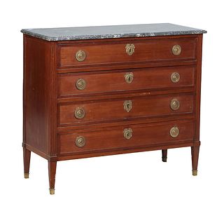 French Louis XVI Style Carved Cherry Marble Top Commode, early 20th c., the ogee edge highly figured gray marble over a bank of four drawers flanked b