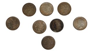 Group of Eight U.S. Silver Dollars, consisting of a 1923 Peace example; a 1925 Peace example; an 1884-0 Morgan Dollar; an 1884 Morgan dollar; an 1889 