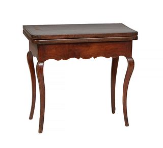 French Louis XV Style Carved Walnut Games Tables, early 20th c., the rounded corner top opening to an inset tan velvet gaming surface, over a scallope