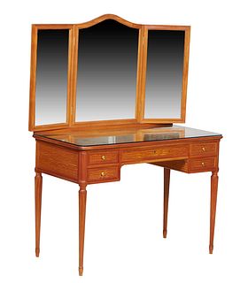 French Louis XVI Style Carved Cherry Dressing Table, 20th c., the tri-fold mirror back on a rounded corner base above a frieze drawer flanked by two s