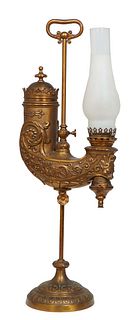 American Gilt Bronze "Aladdin" Oil Lamp, 19th c., with relief decoration and original fuel container, with adjustable height, on a weighted circular b