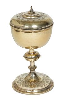 Sterling Covered Ciborium, 19th c., by the W. J. Feeley Co., with relief decoration and a gilt washed interior, H.- 12 3/4 in., Dia. 7 in., Wt.- 29.2 