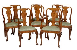 Set of Eight (6+2) English Carved Burled Walnut Queen Anne Dining Chairs, early 20th c., the arched canted back with an urn form vertical splat, over 