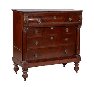 American Classical Carved Mahogany Chest, 19th c., the stepped top over a convex frieze drawer above three setback graduated drawers, on a plinth base