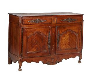 French Provincial Louis XV Style Inlaid Carved Cherry Sideboard, 19th c., the canted corner three board top over two setback inlaid frieze drawers wit