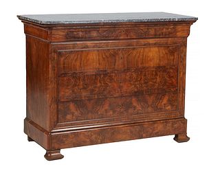 French Louis Philippe Carved Walnut Marble Top Commode, 19th c., the reeded edge rounded corner gray marble over a cavetto frieze drawer above three d